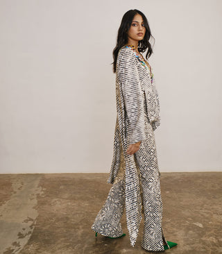 Printed silk oversized top with fitted pants